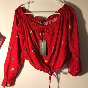 Red flowered off the shoulder blouse